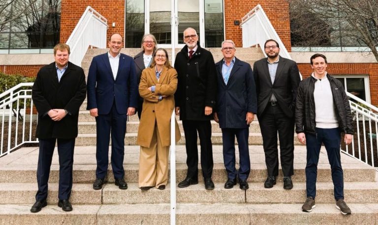 German delegation on the steps at Bentley University